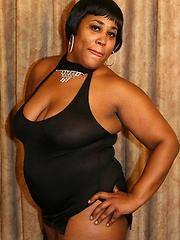 Sassy ebony BBW posing and taking a cock in her pussy by riding on top of a black hunk