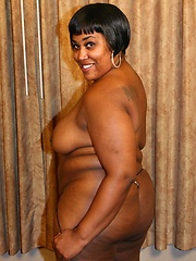 Sassy ebony BBW posing and taking a cock in her pussy by riding on top of a black hunk