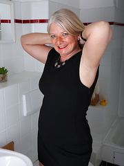 Naughty German housewife taking a shower